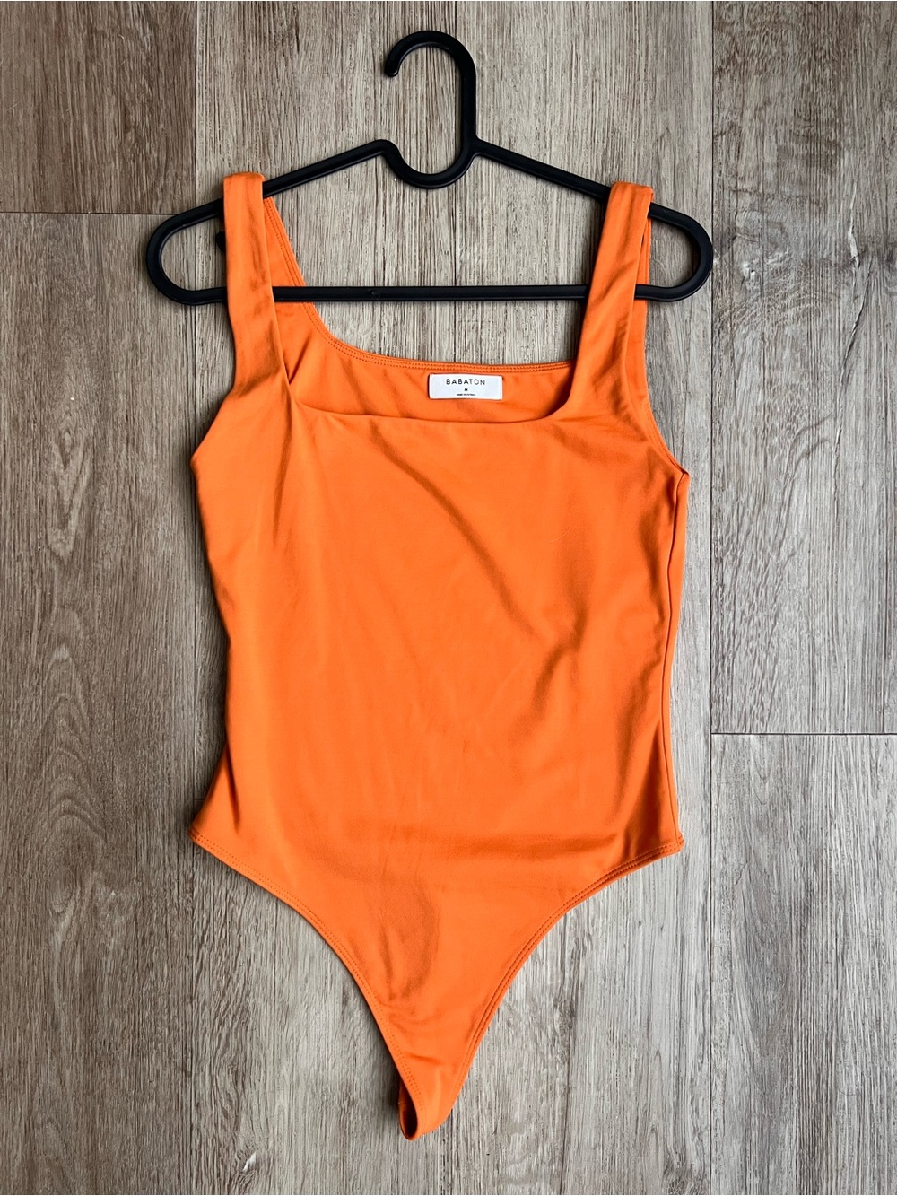 Orange babaton body suit